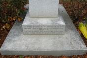 Inscription on base of the <i>Our Lady</i> statue reads: <i>IN DEVOUT MEMORY OF THE VICTIMS OF THE FIRE, DECEMBER 1, 1958, AT OUR LADY OF THE ANGELS SCHOOL. ERECTED BY THE PARISHIONERS, THE PRIESTS, THE SISTERS, AND THEIR PASTOR, THE RT. REV. MSGR. JOSEPH F. CUSSEN.</i>
